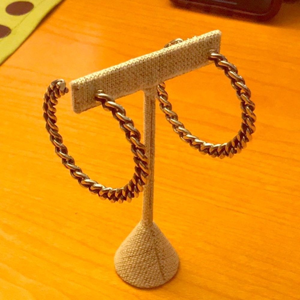 Sterling silver chain hoop earrings.